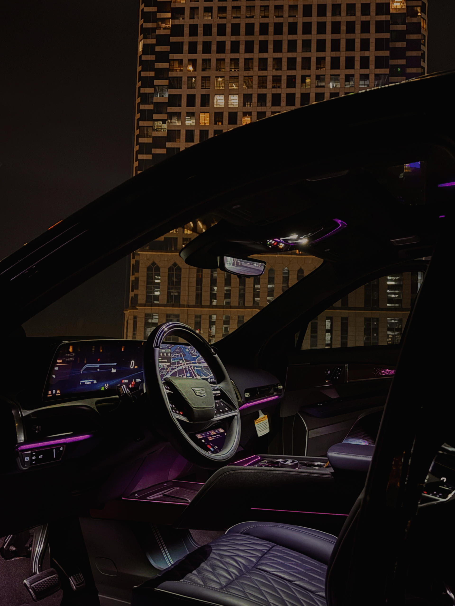 Luxury vehicle interior with ambient lighting